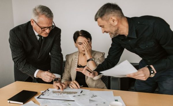 Performance Pressure and Compliance Risk